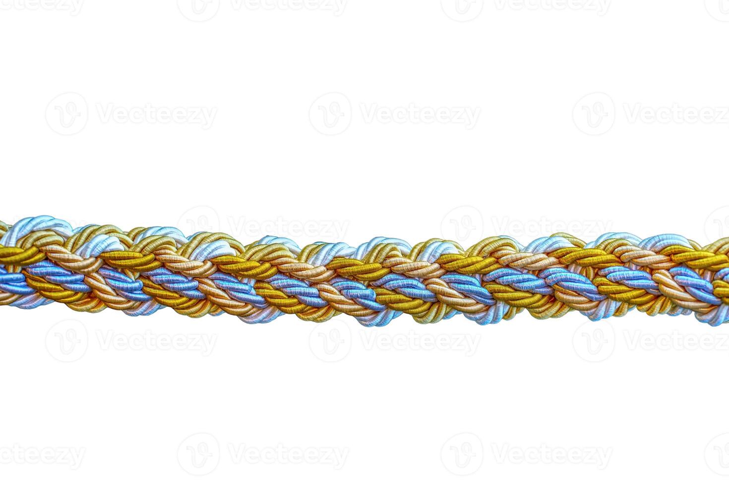 Close-up view of a complexly woven rope with gold, blue, and white strands, highlighting detailed craftsmanship. photo