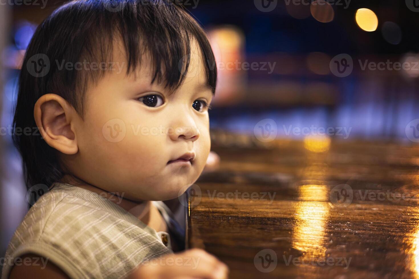 Toddlers Are Aaiting For Food At The Dining Table photo