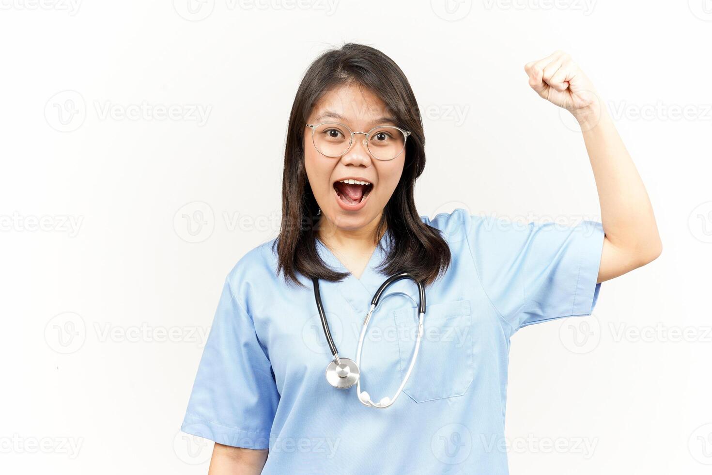 Showing Strength Arms Of Asian Young Doctor Isolated On White Background photo