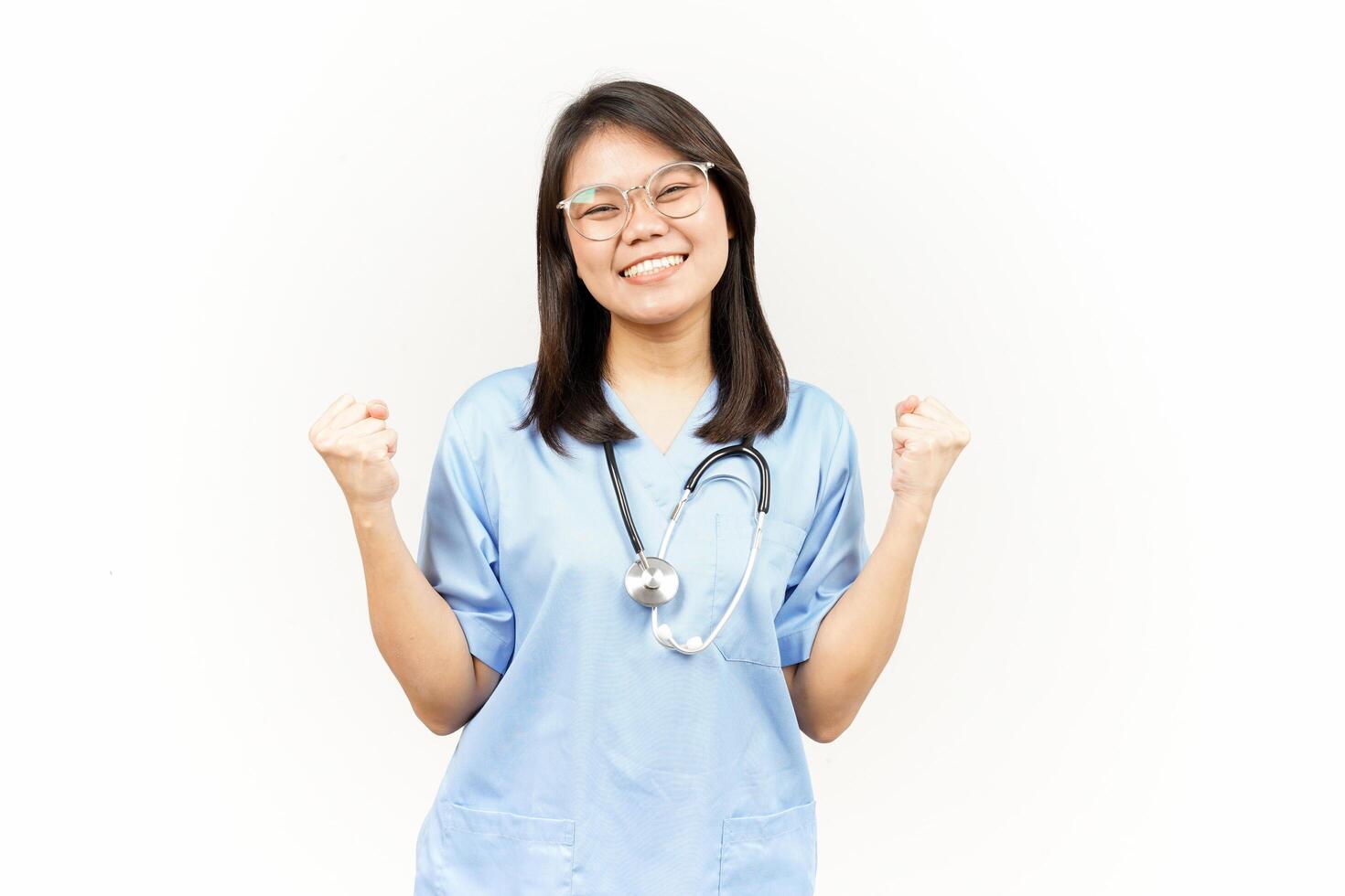 Yes Excited Gesture Of Asian Young Doctor Isolated On White Background photo
