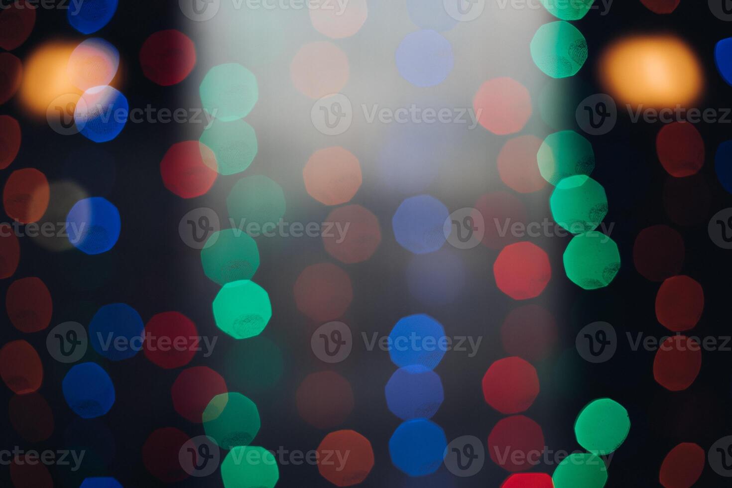 circles Color Bokeh against a dark background photo