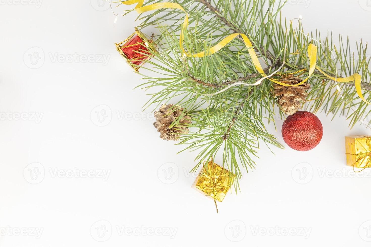 Christmas flat lay styled scene - top view frame with evergreen tree twigs and christmas decorations photo