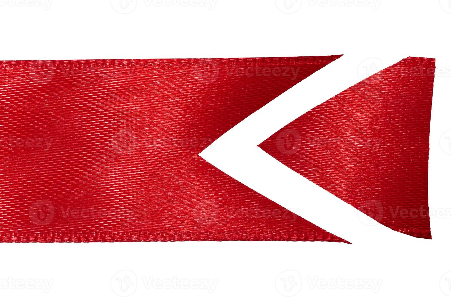 Piece of red silk ribbon with sharp end on isolated background, decor photo