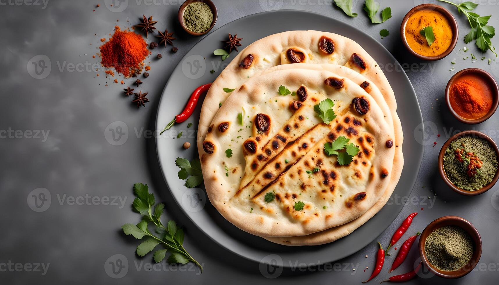 special roghni naan or kulcha served in plate isolated on grey background top view of pakistani and indian spices food photo