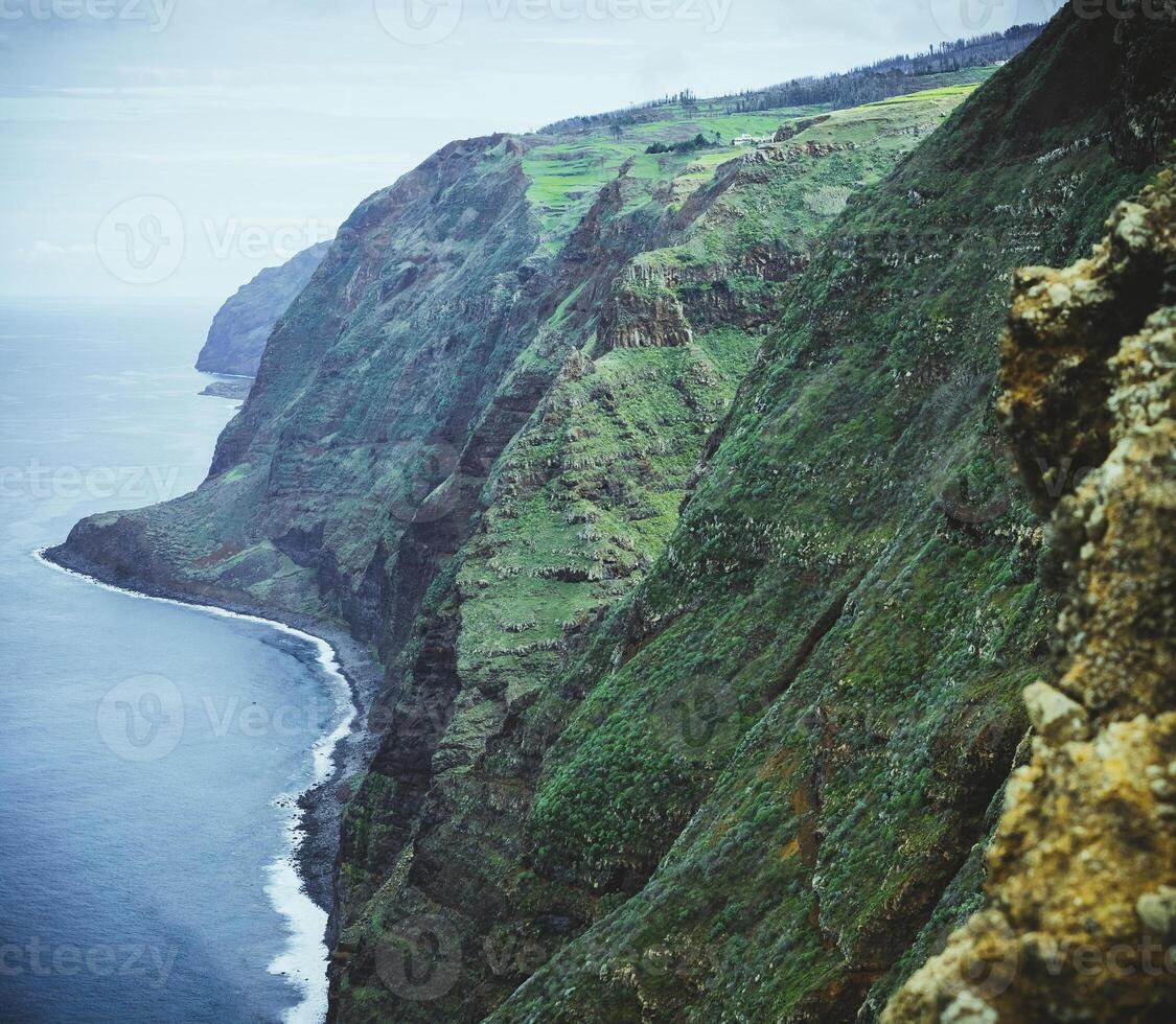 View on the steep cliffs on the western coastline of Madeira near Ponta da Pargo photo