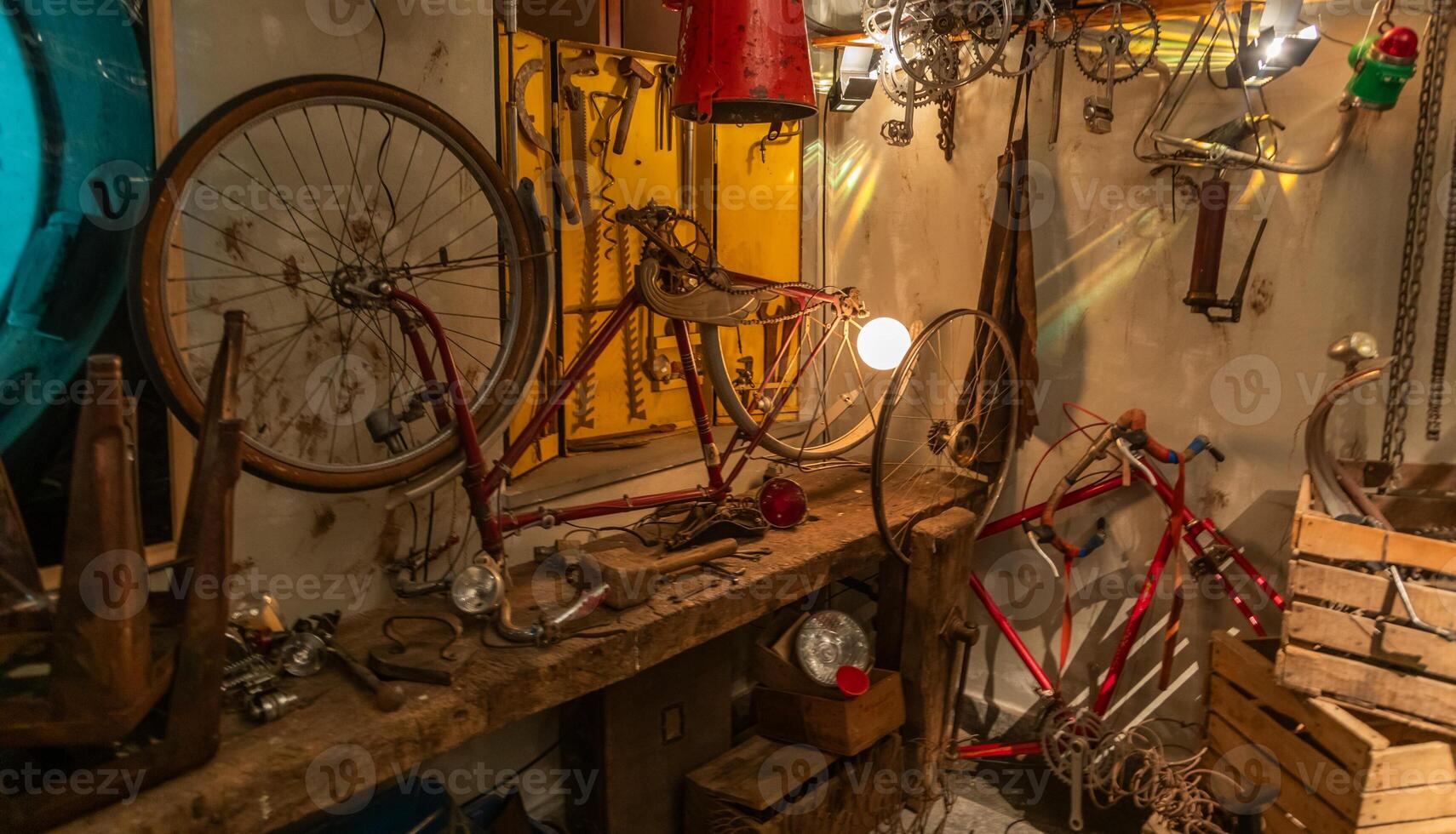 Old bicycle repair shop. Fixing mechanic issues in a garage, maintenance photo