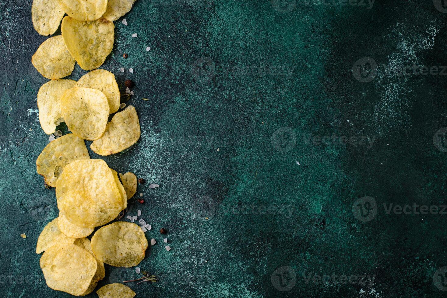 Crispy salty homemade potato chips photo