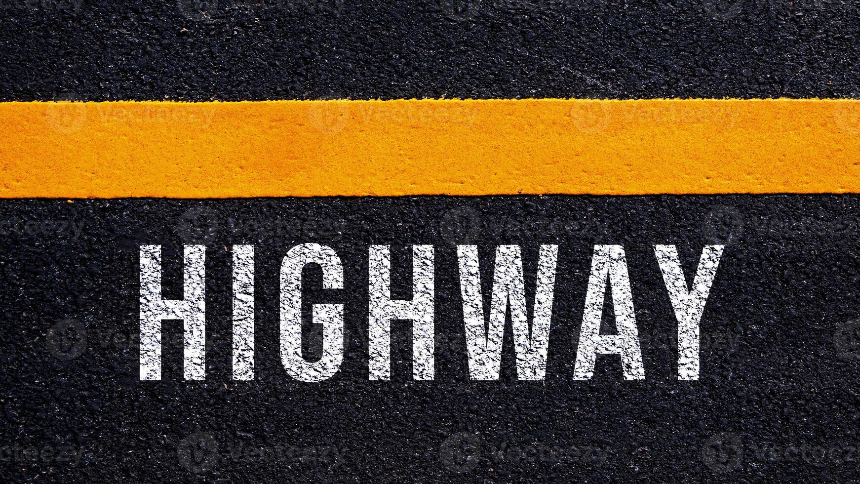 HIGHWAY, highway text written and yellow line on asphalt road ground. photo