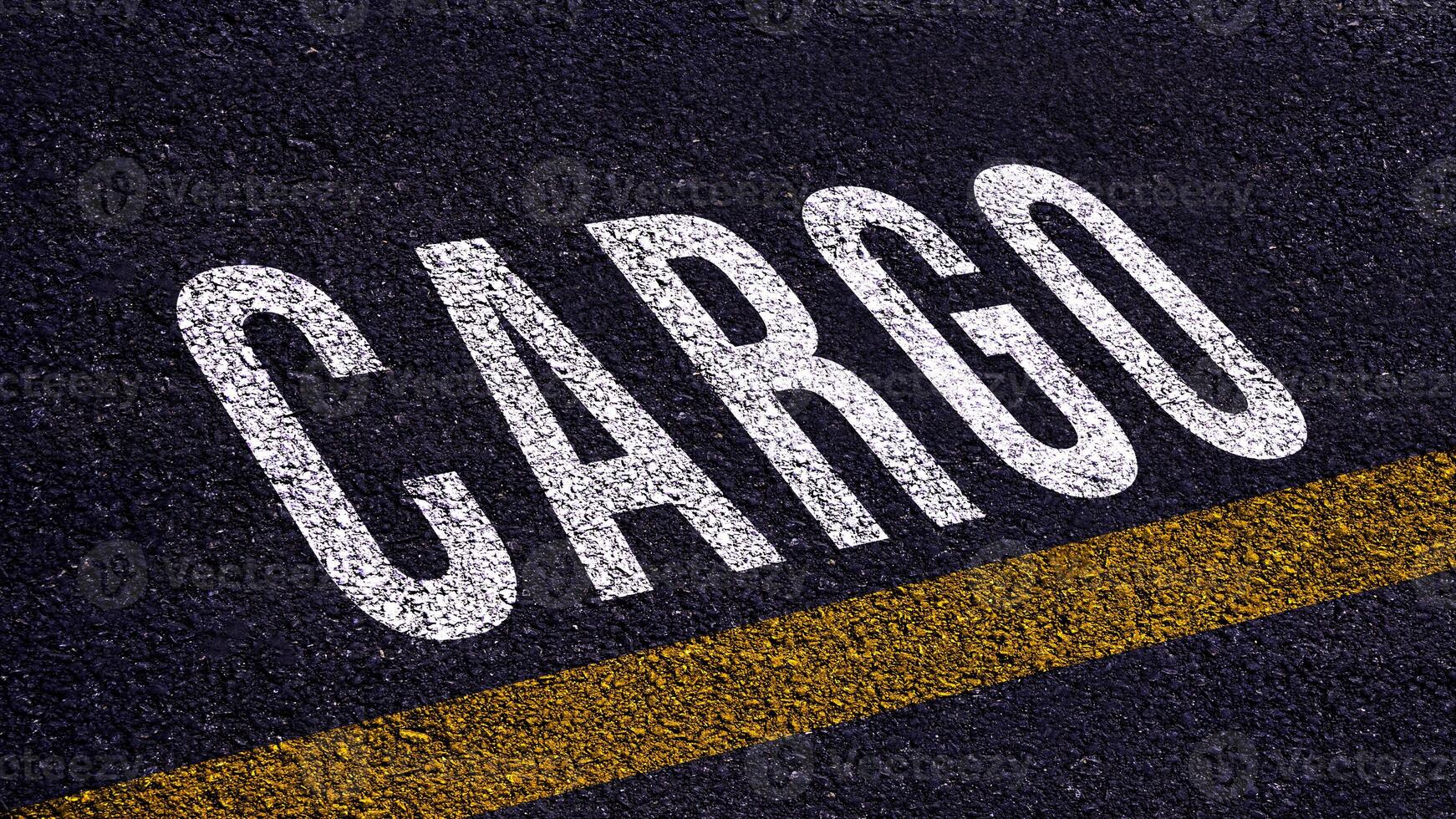 CARGO, cargo text written and yellow line on asphalt road ground. photo