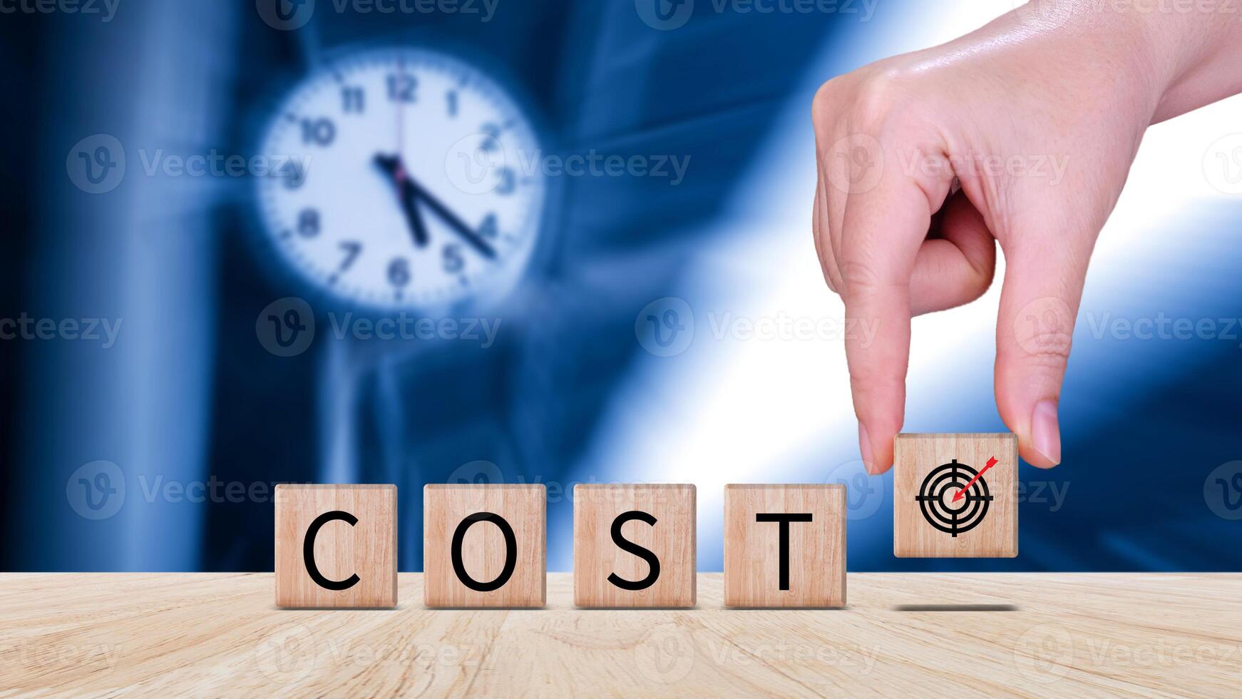 Cost reduction concept on wooden cube, Expenses and saving money, Business strategy and project management, cost reduction, efficient business and budget cutting. photo