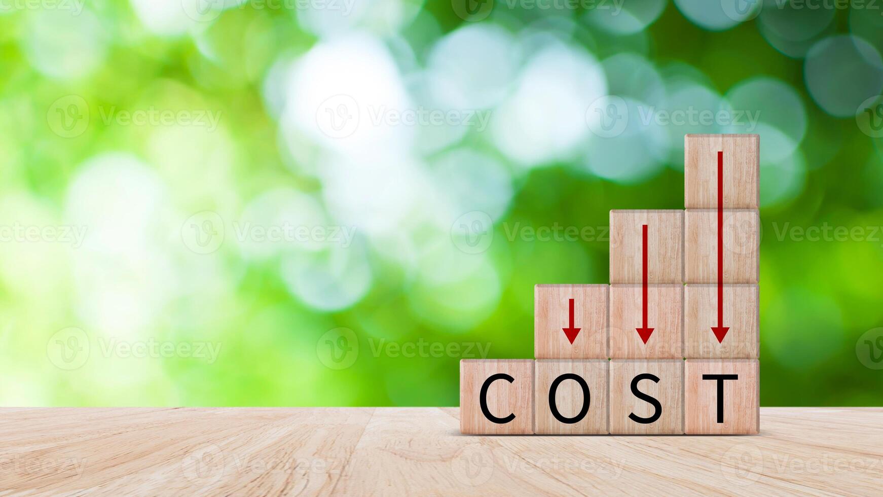 Cost reduction concept on wooden cube, Expenses and saving money, Business strategy and project management, cost reduction, efficient business and budget cutting. photo