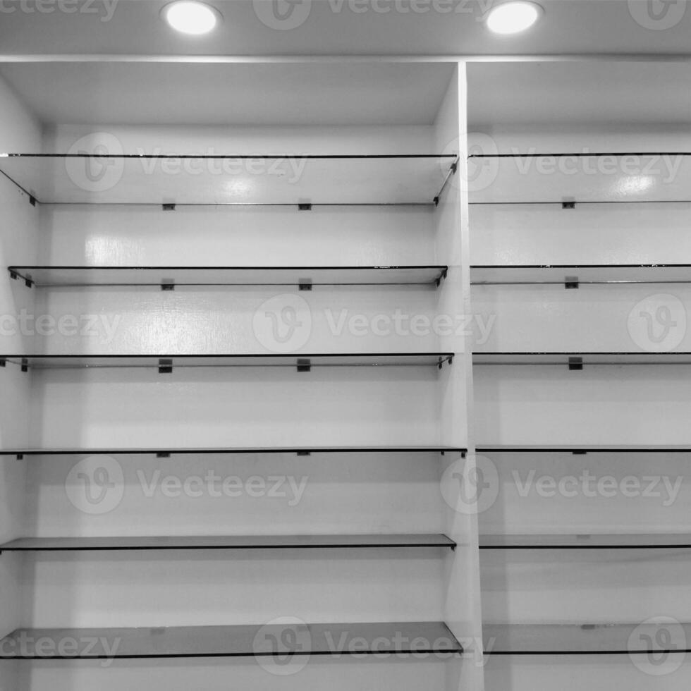 Empty shelves on a market photo