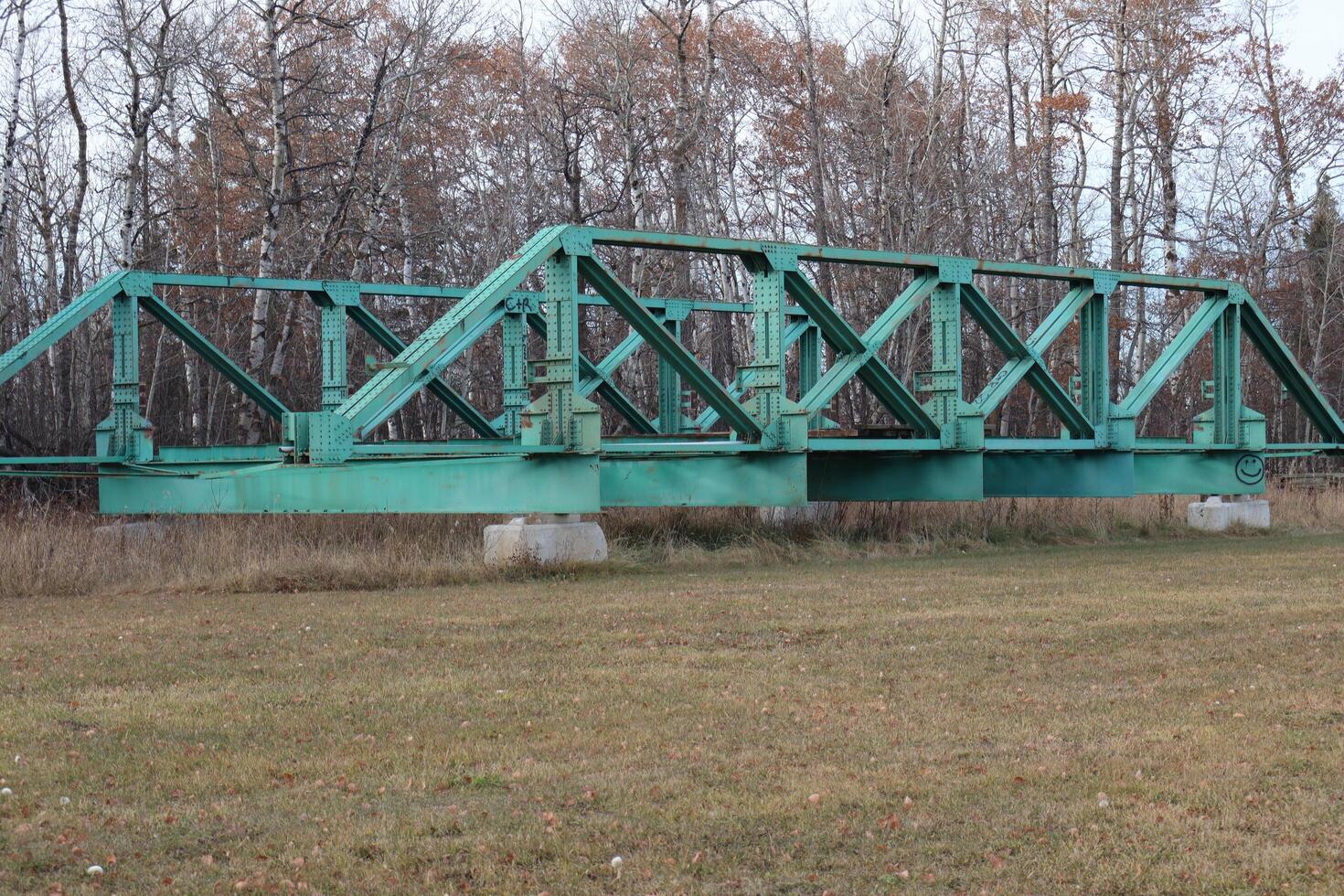 A bridge deck with large beams, on dry land. photo