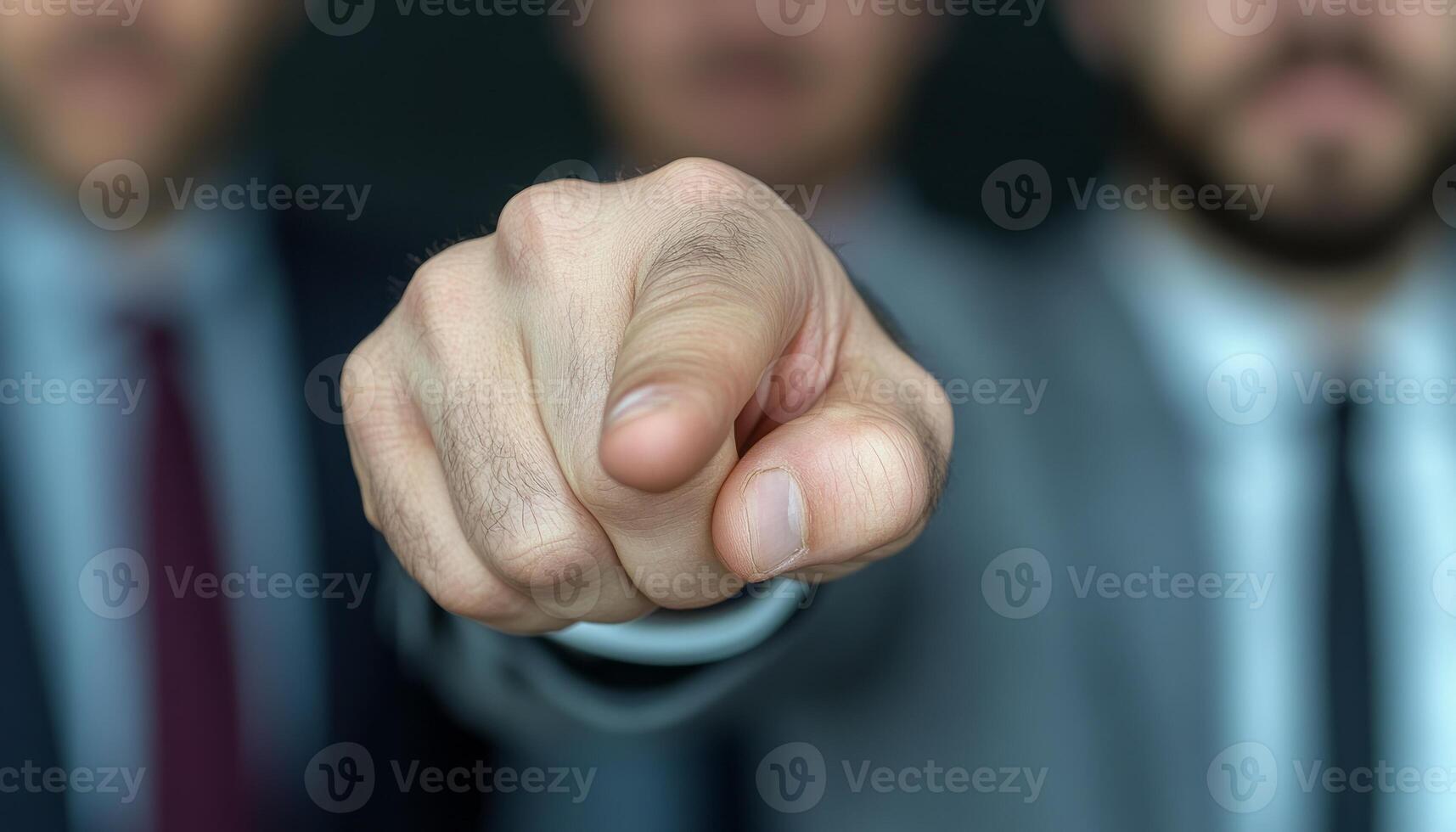 Three businessmen in suits are pointing at the viewer, emphasizing their message photo
