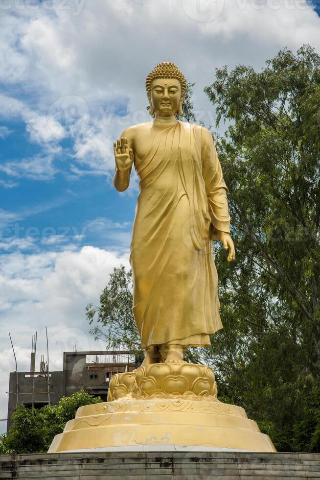 Statue of Buddha in sky background. Giant Buddha Statue. photo