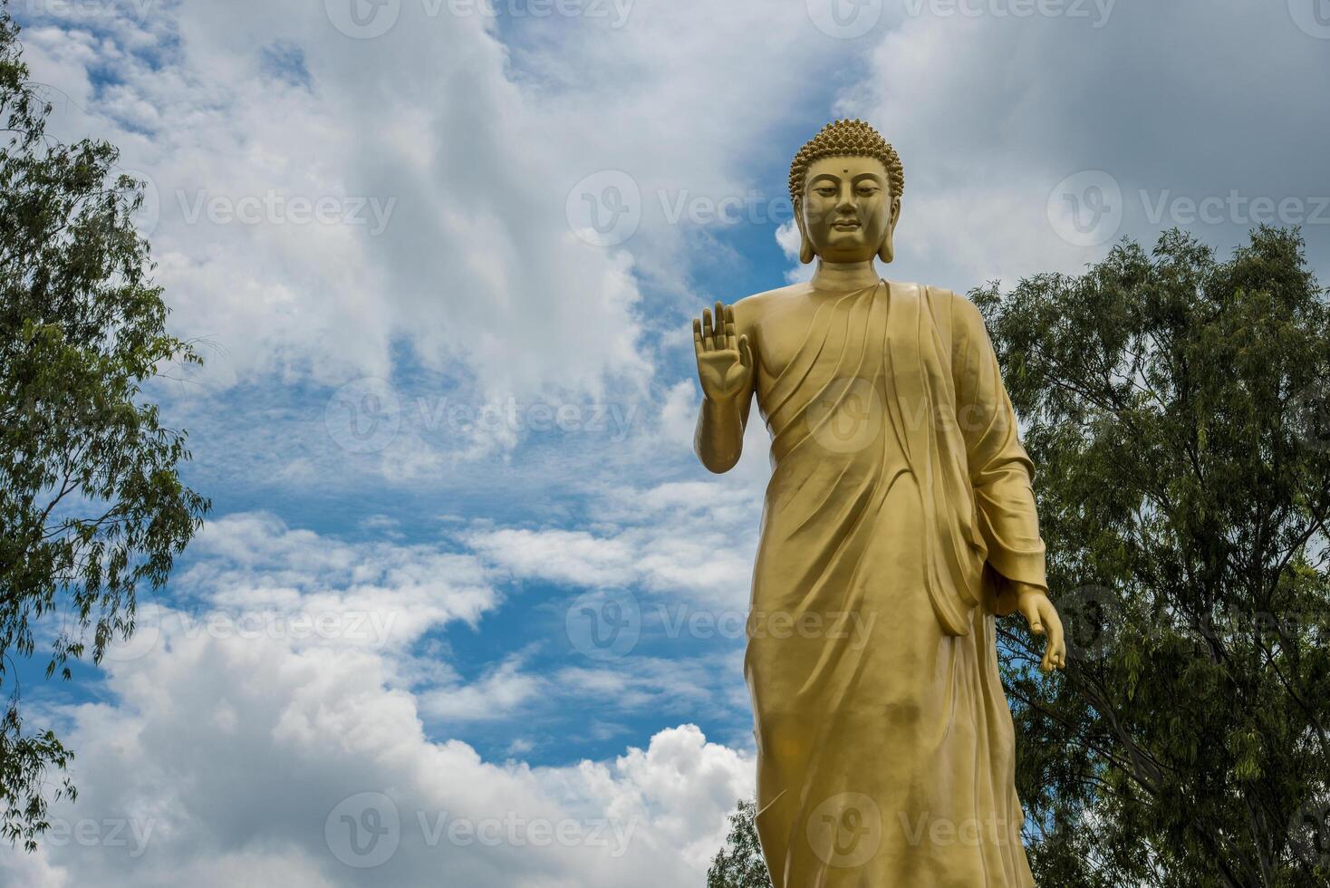 Statue of Buddha in sky background. Giant Buddha Statue. photo