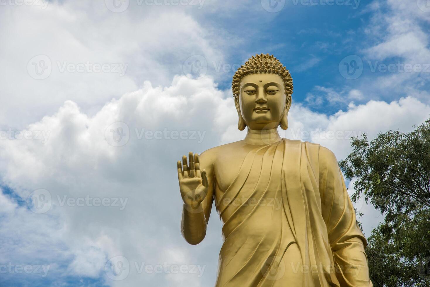 Statue of Buddha in sky background. Giant Buddha Statue. photo
