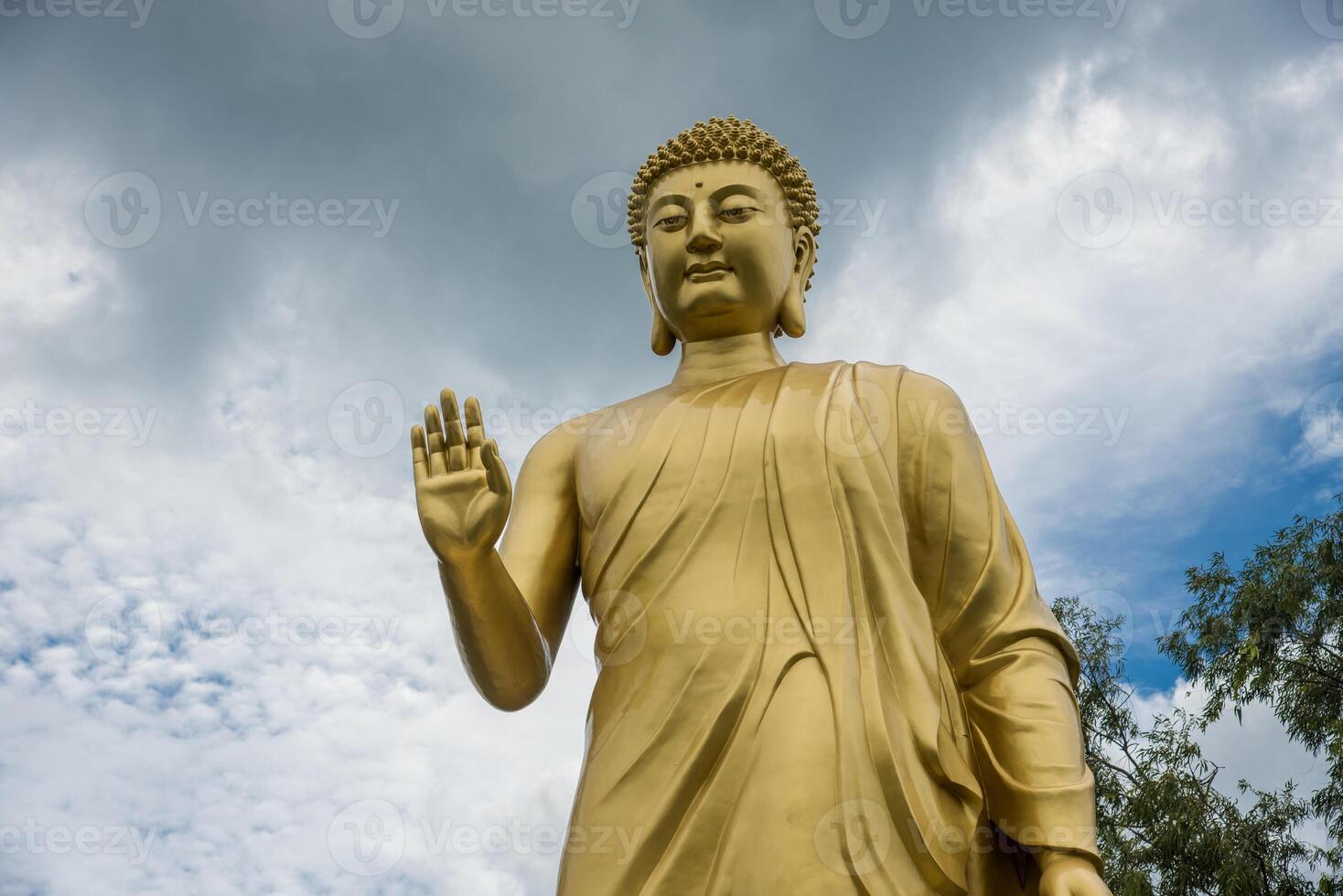 Statue of Buddha in sky background. Giant Buddha Statue. photo