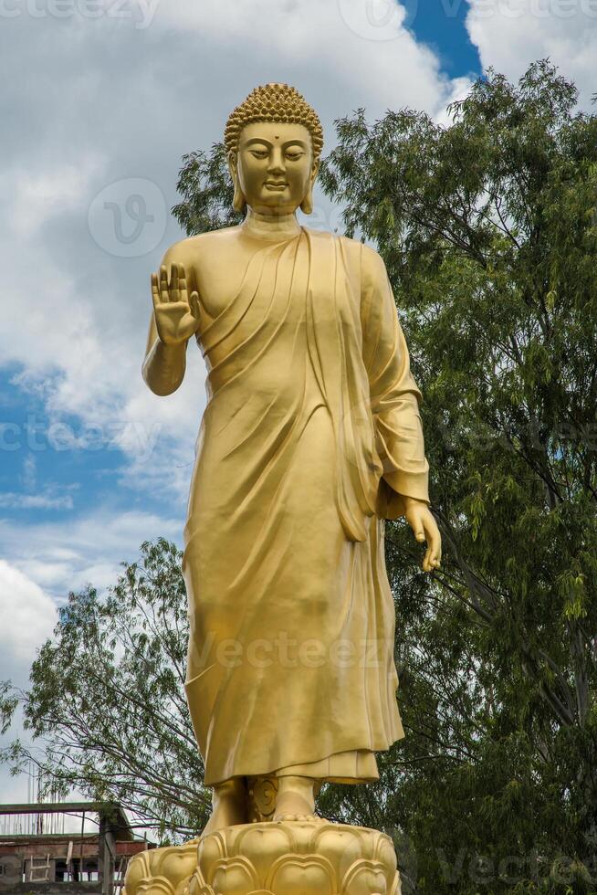 Statue of Buddha in sky background. Giant Buddha Statue. photo