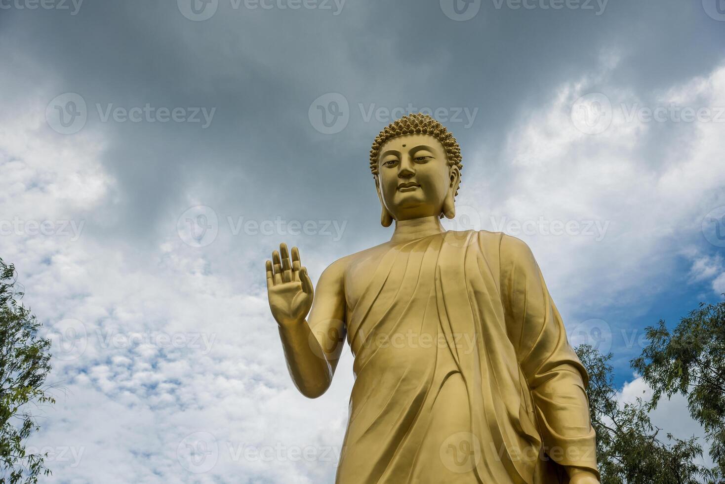 Statue of Buddha in sky background. Giant Buddha Statue. photo