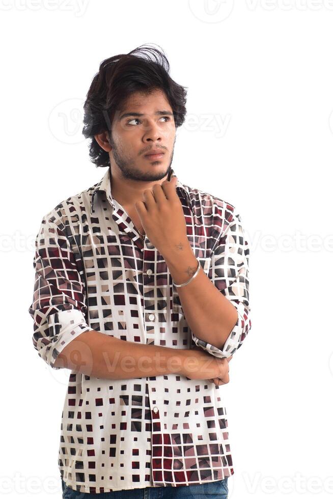 Young man posing on a white background photo