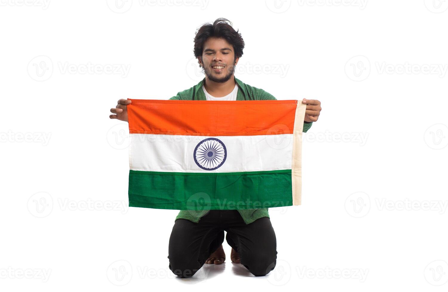 Young man with Indian flag or tricolor on white background, Indian Independence day, Indian Republic day photo