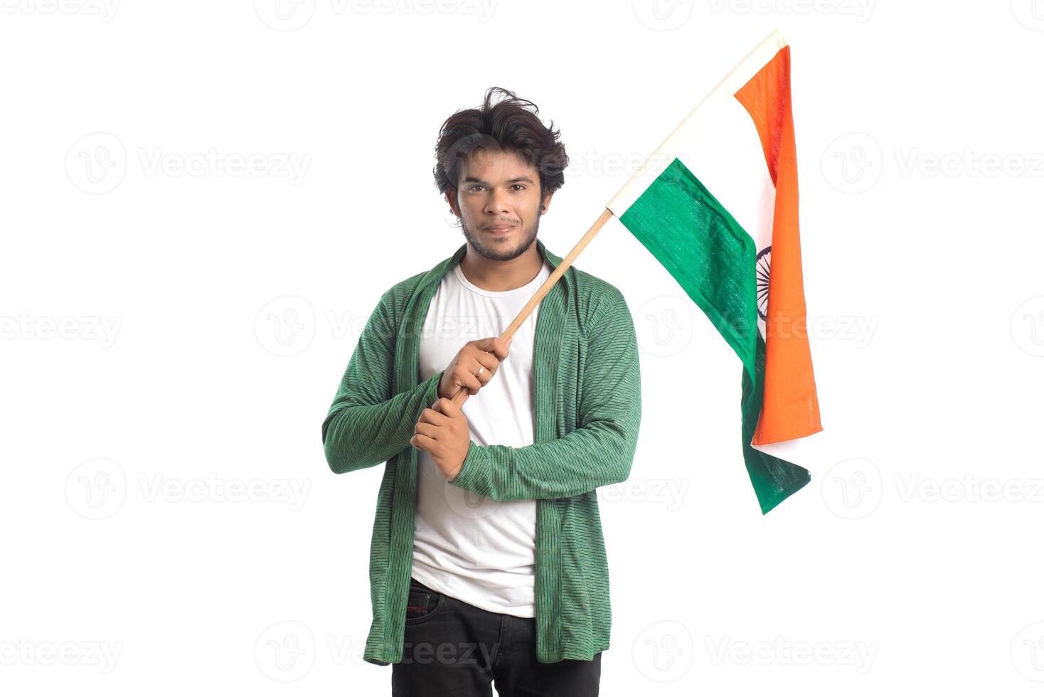 Young man with Indian flag or tricolor on white background, Indian Independence day, Indian Republic day photo