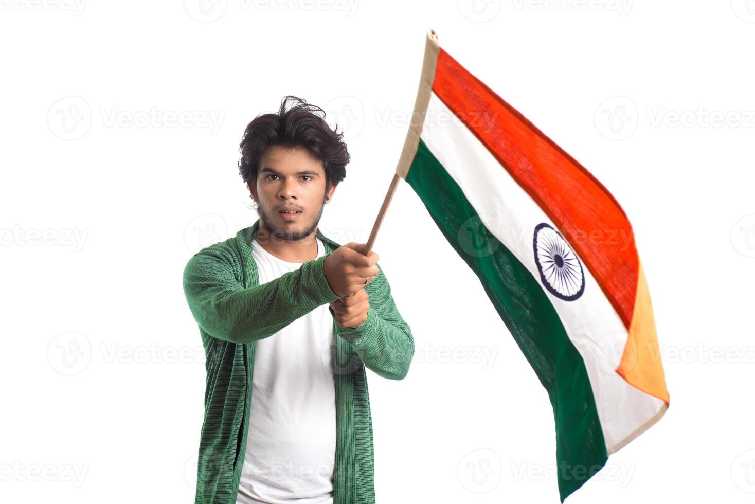Young man with Indian flag or tricolor on white background, Indian Independence day, Indian Republic day photo