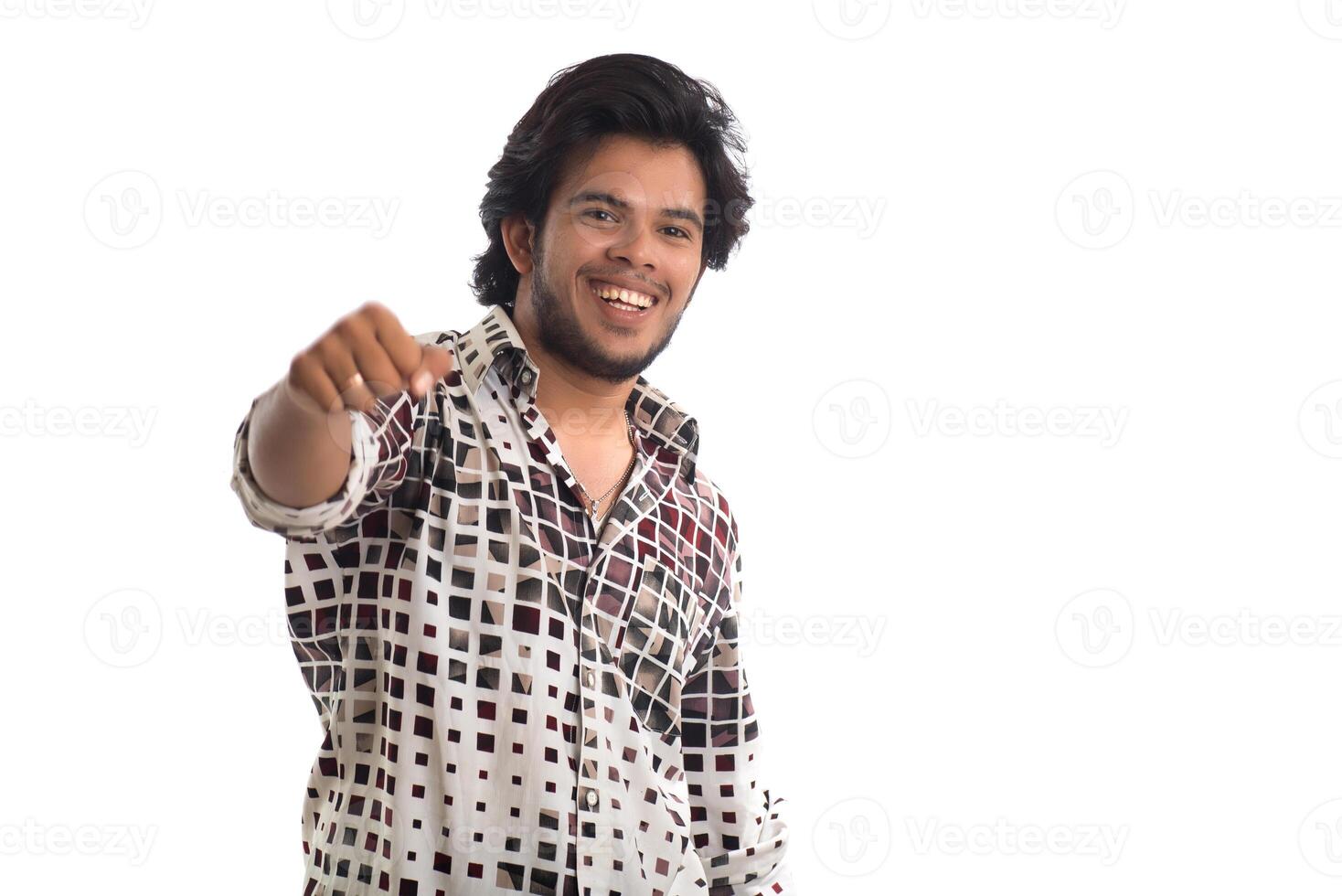 Young man posing on a white background photo