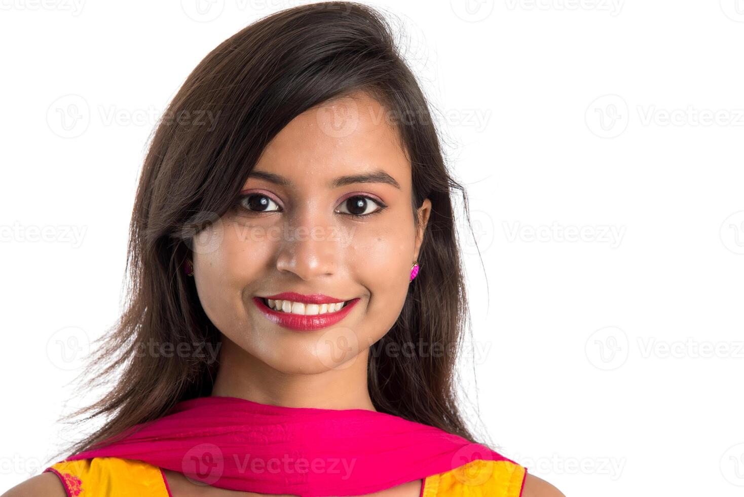 Portrait of beautiful young smiling girl on a white background. photo