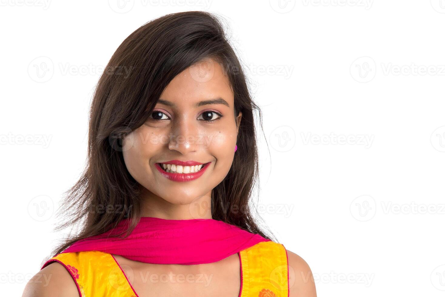 Portrait of beautiful young smiling girl on a white background. photo