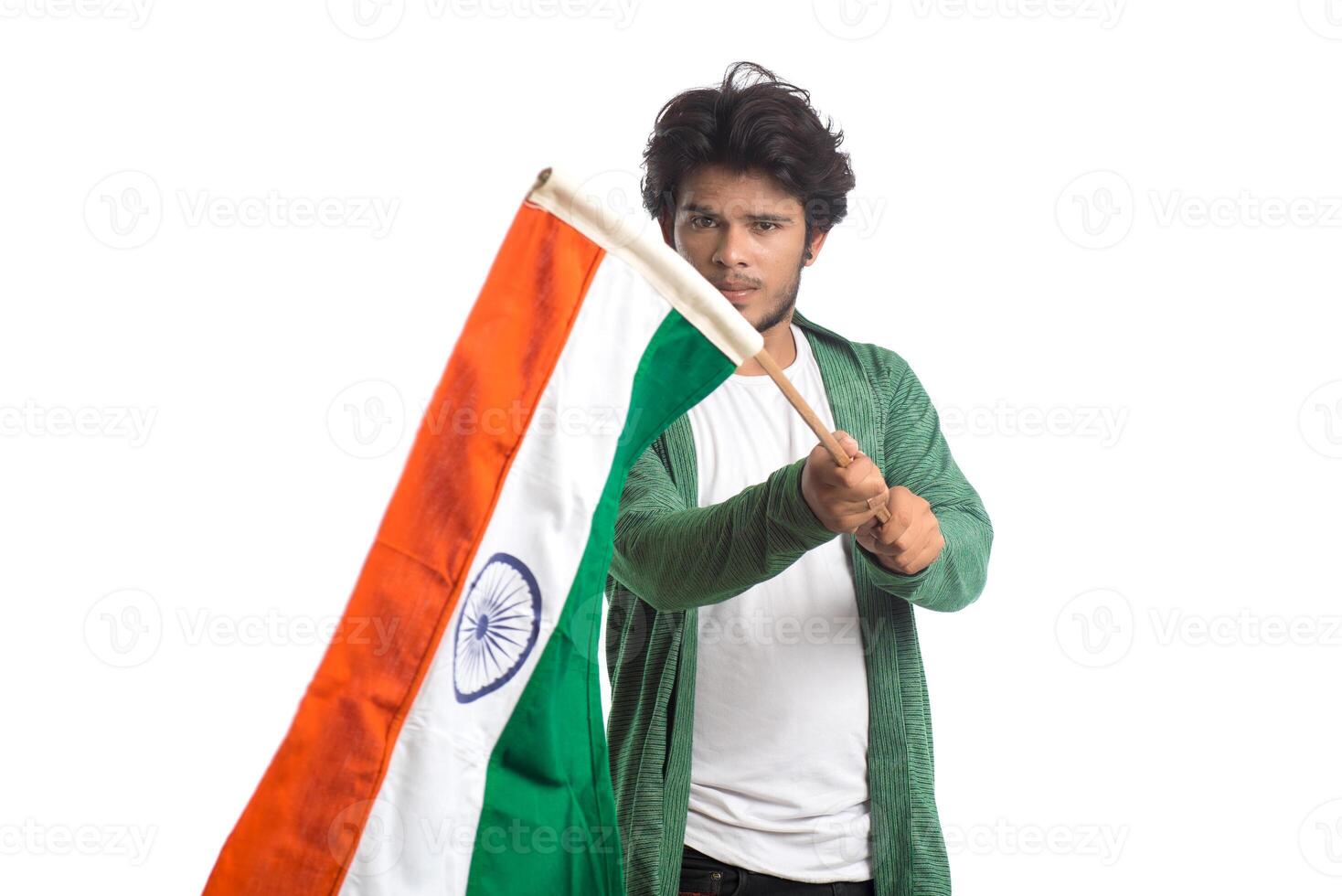 Young man with Indian flag or tricolor on white background, Indian Independence day, Indian Republic day photo