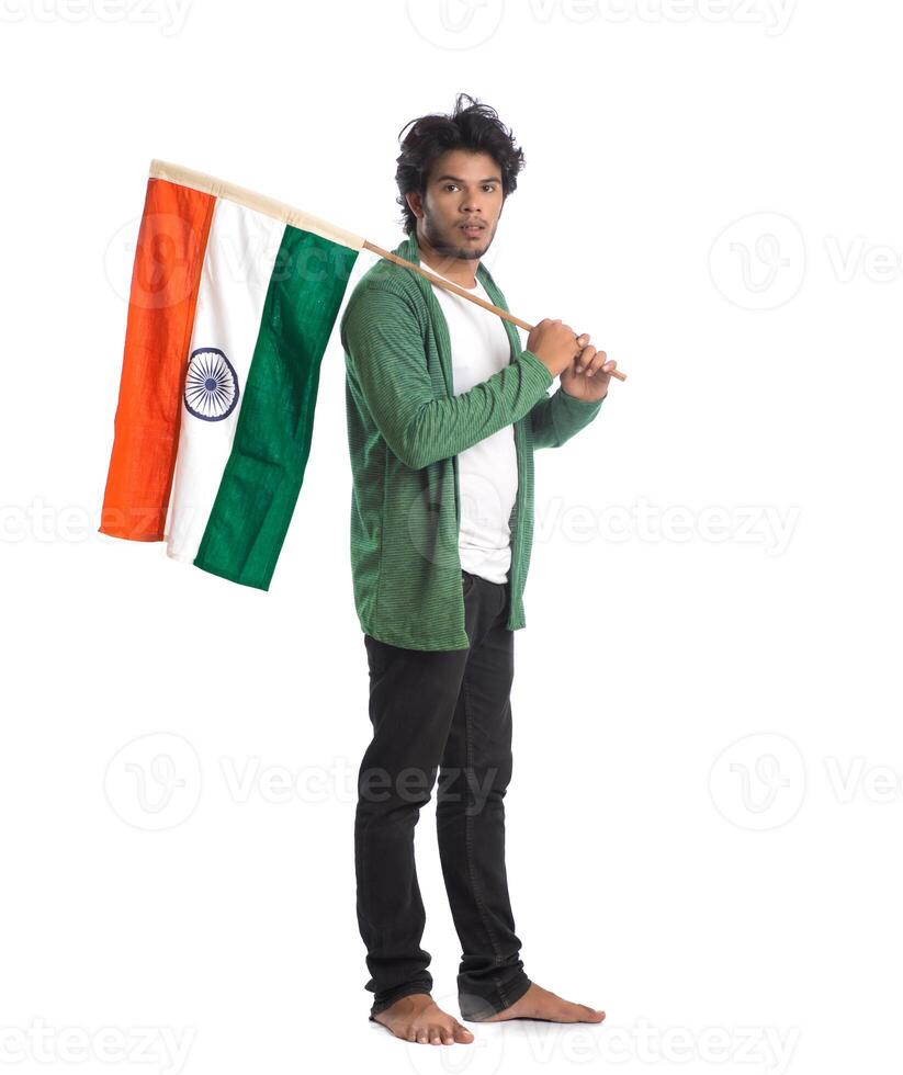 Young man with Indian flag or tricolor on white background, Indian Independence day, Indian Republic day photo