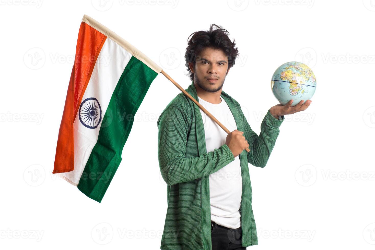Young man with Indian flag or tricolor with world globe on white background, Indian Independence day, Indian Republic day photo