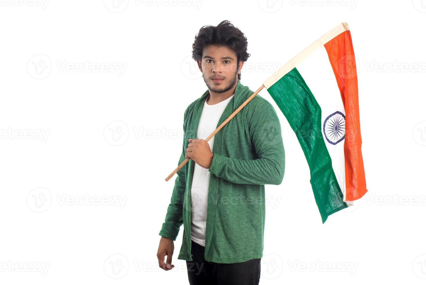 Young man with Indian flag or tricolor on white background, Indian Independence day, Indian Republic day photo