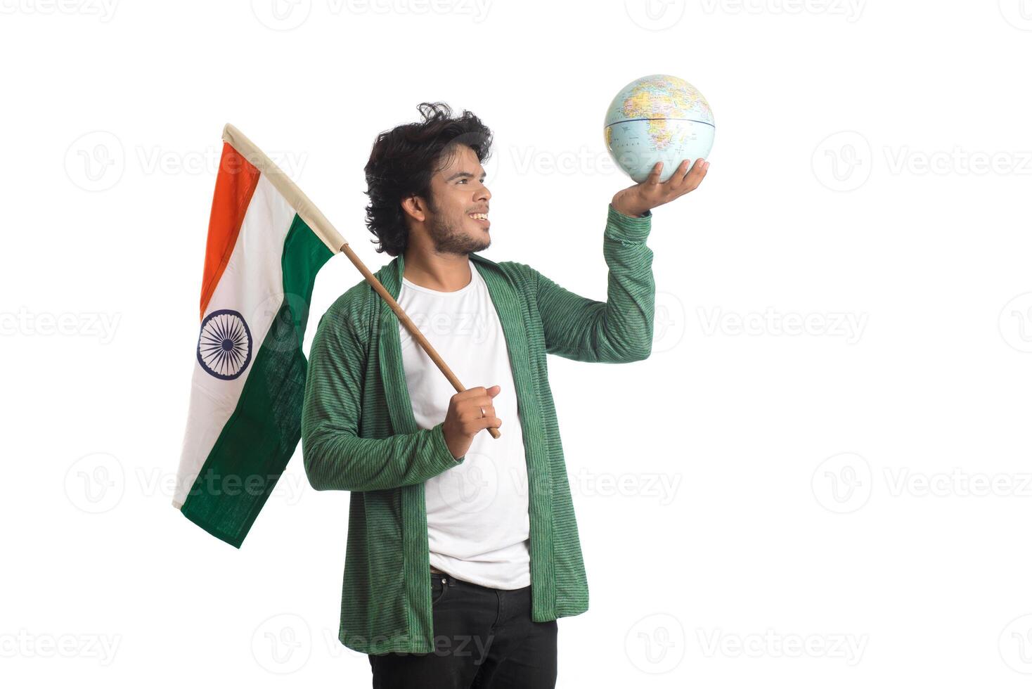 Young man with Indian flag or tricolor with world globe on white background, Indian Independence day, Indian Republic day photo