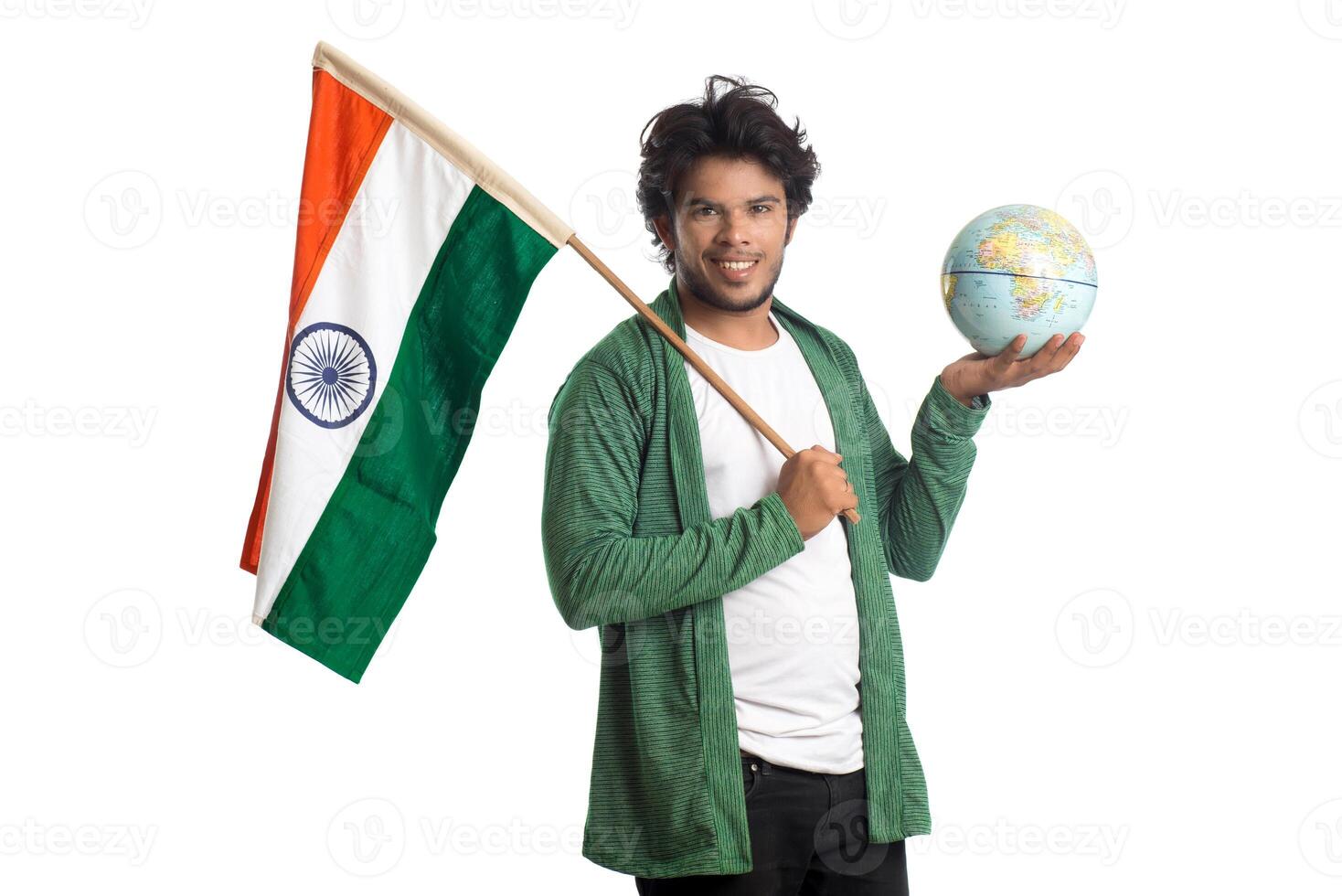 Young man with Indian flag or tricolor with world globe on white background, Indian Independence day, Indian Republic day photo