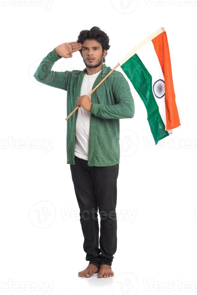 Young man with Indian flag or tricolor on white background, Indian Independence day, Indian Republic day photo