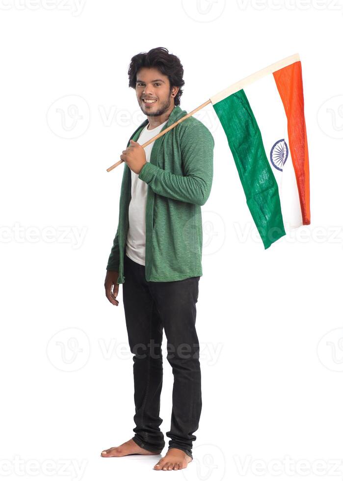 Young man with Indian flag or tricolor on white background, Indian Independence day, Indian Republic day photo