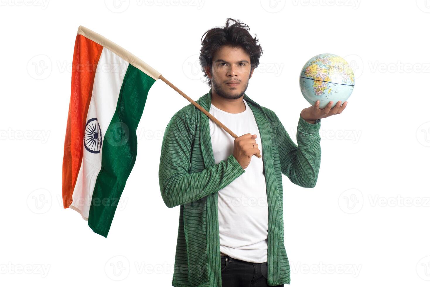 Young man with Indian flag or tricolor with world globe on white background, Indian Independence day, Indian Republic day photo