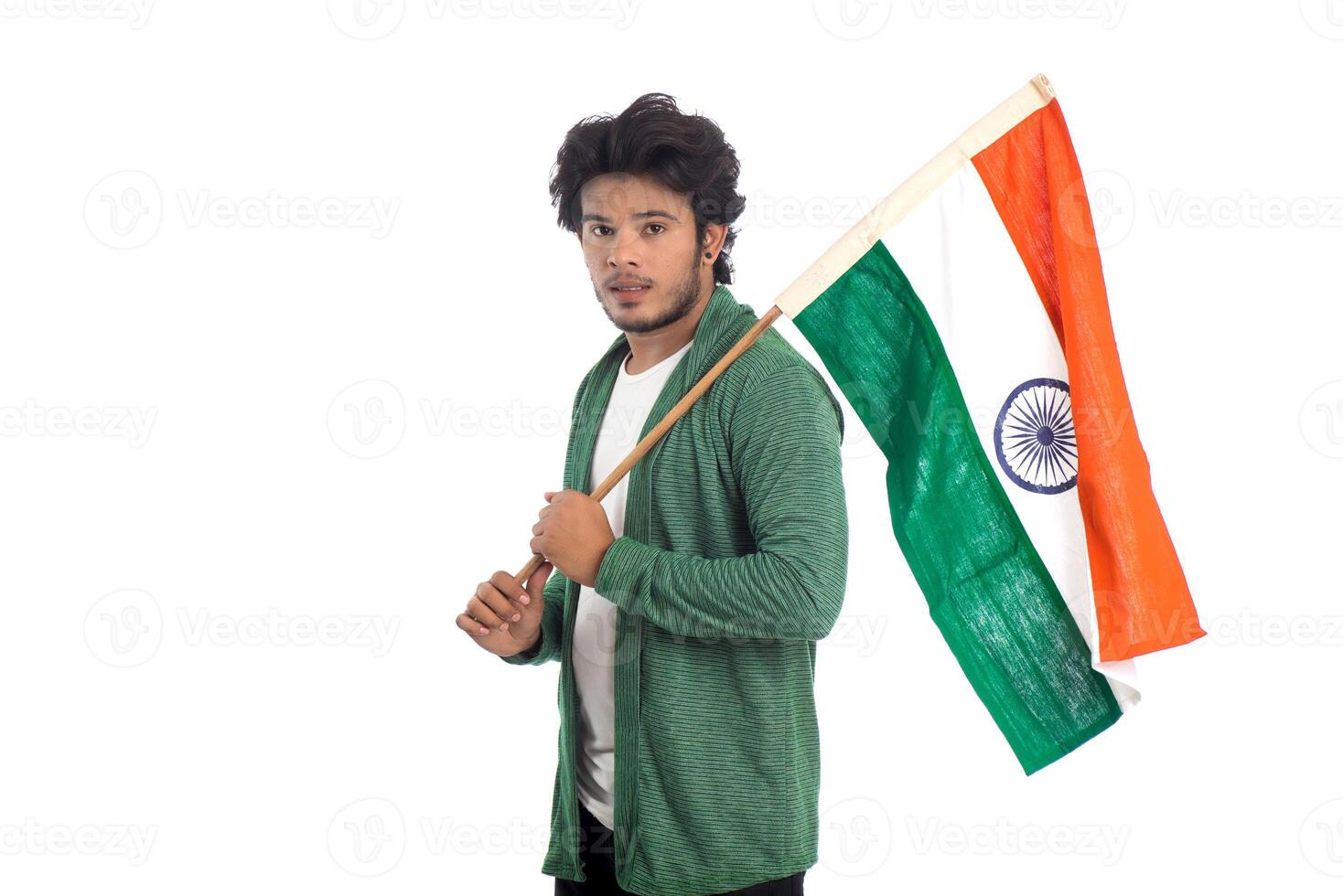 Young man with Indian flag or tricolor on white background, Indian Independence day, Indian Republic day photo