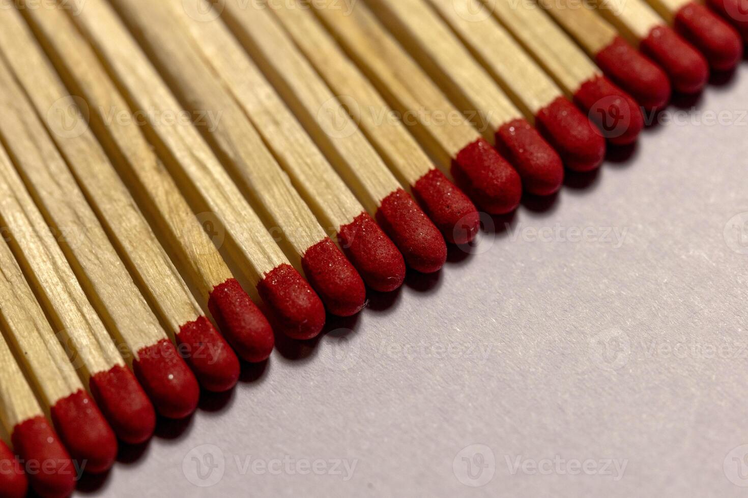 Matches lie in a row, close-up photo