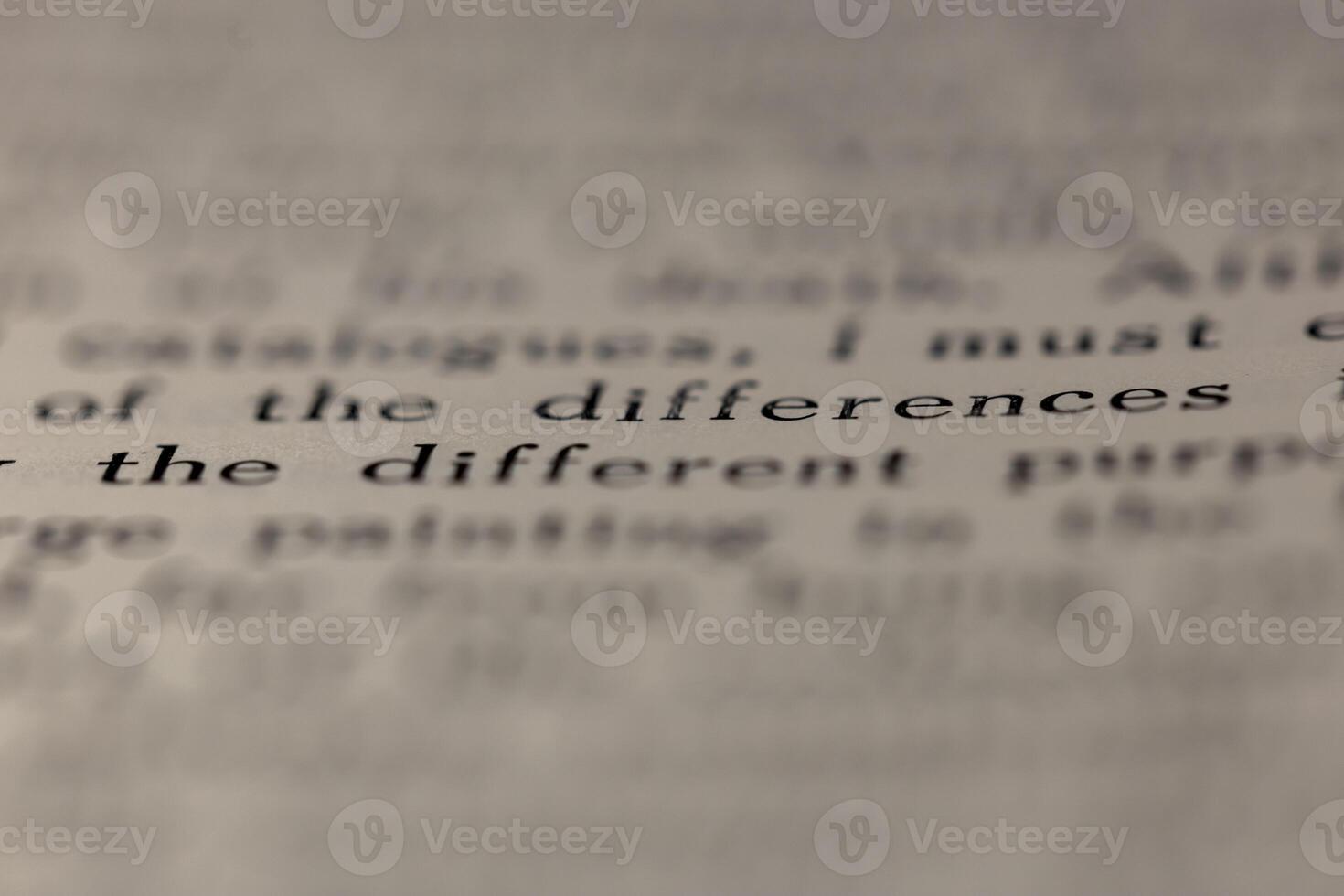 macro photography of a book page with text in English font photo