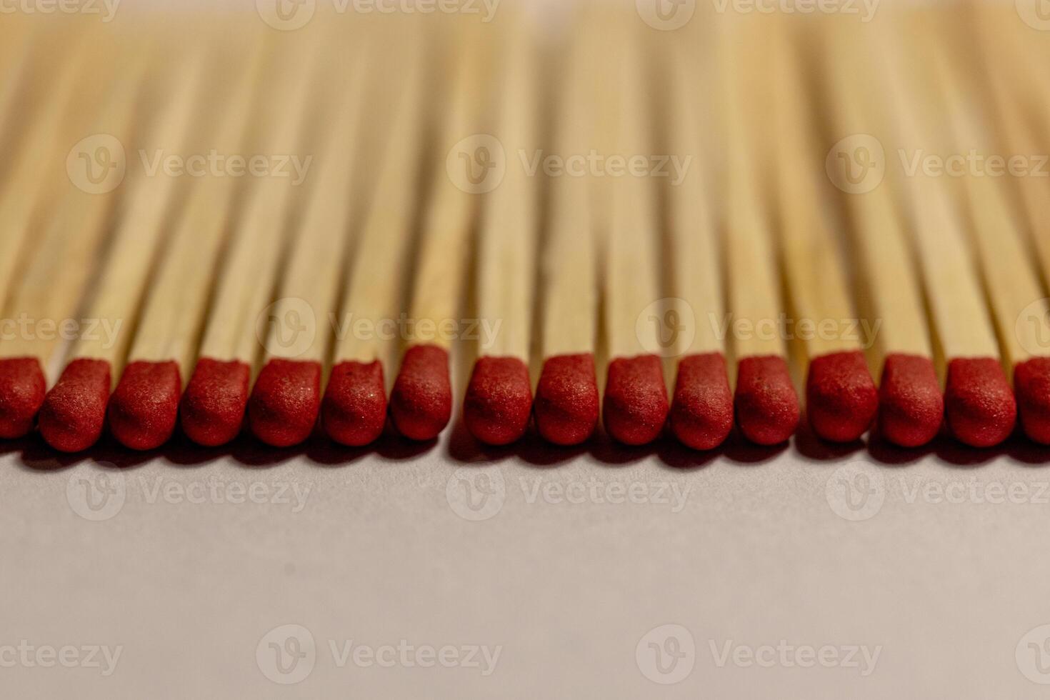 Matches lie in a row, close-up photo