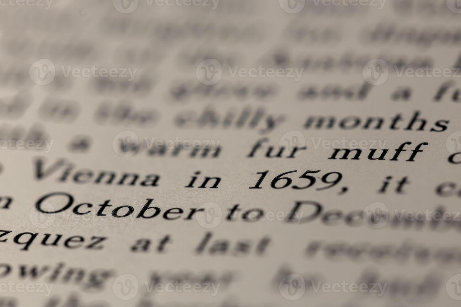 macro photography of a book page with text in English font photo