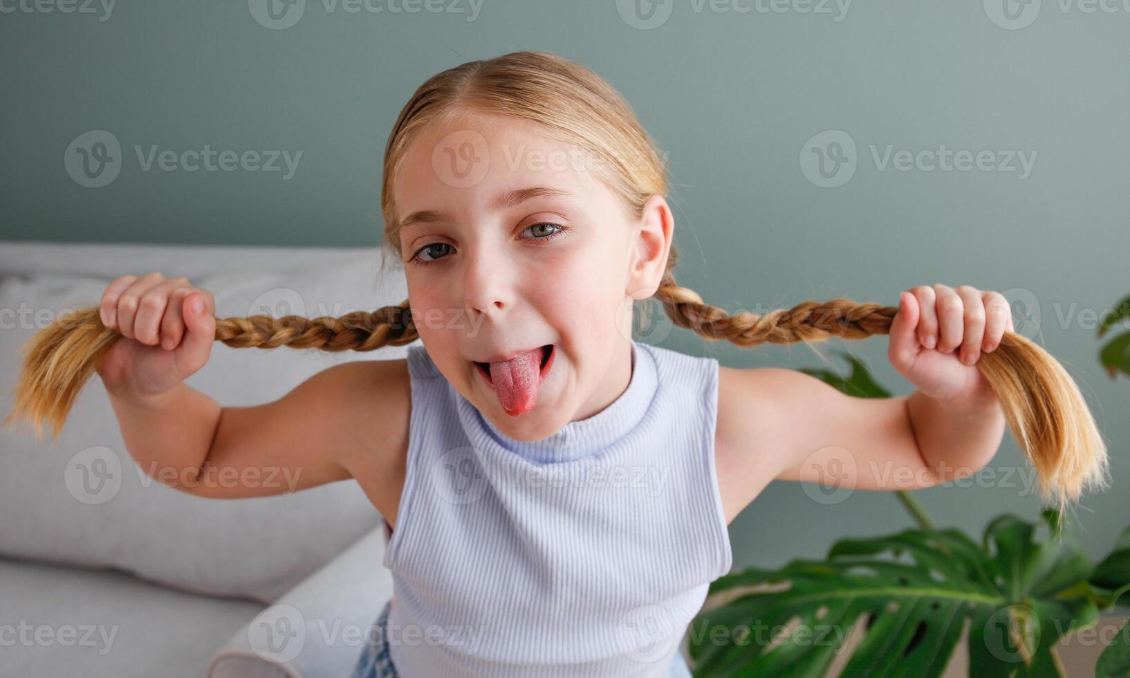 The girl is making faces photo