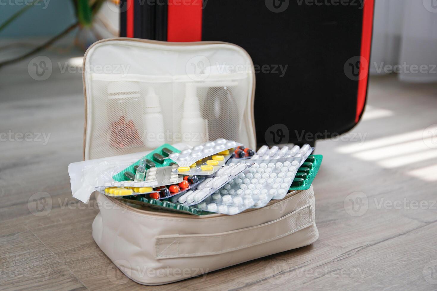 Summer beach accessories for your sea holiday and pills. Concept of medication required in journey. photo