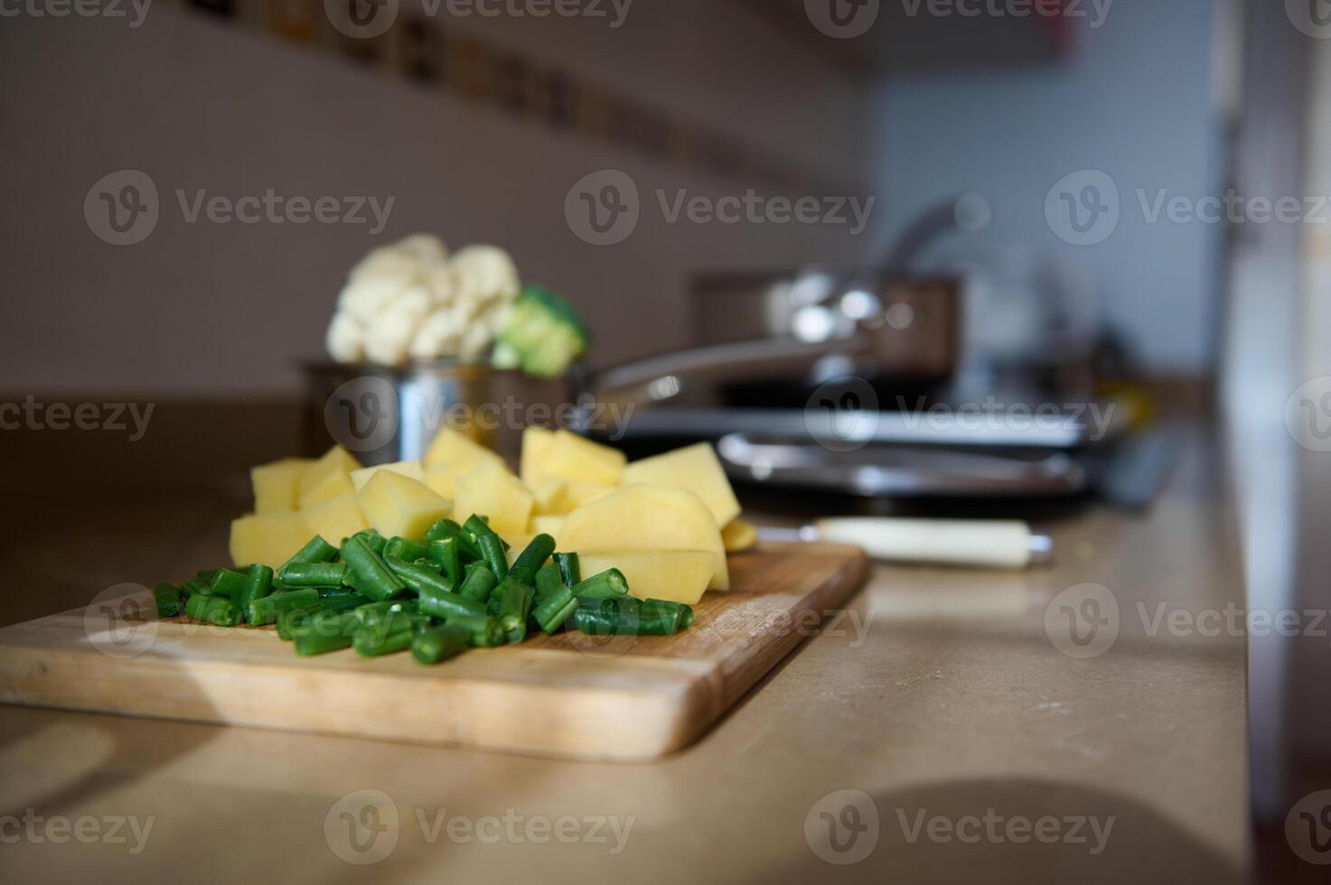 Fresh vegetables prepared on kitchen counter for cooking photo
