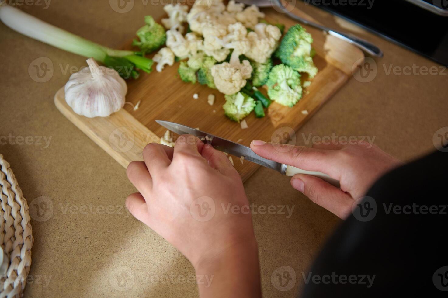 Preparing fresh vegetables for a healthy home-cooked meal photo