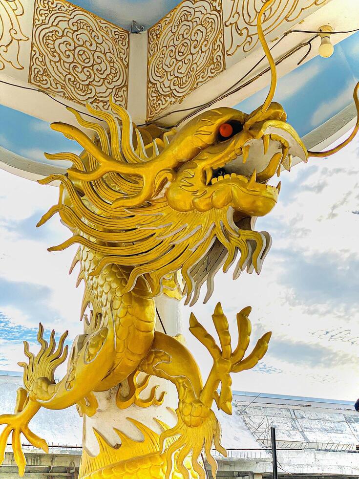 Dragon statue,dragon symbol,dragon Chinese is a beautiful Thai and Chinese architecture of shrine, temple.Symbol of good luck and prosperity during the Chinese New Year celebrations. photo